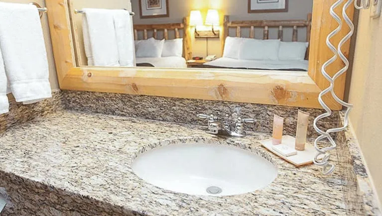 The bathroom sink in the accessible Family Fireplace Suite
